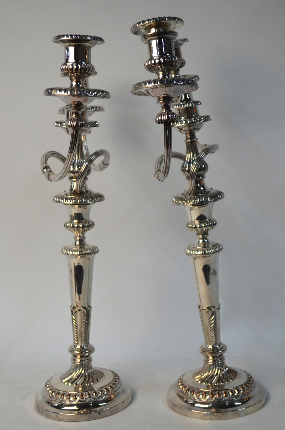 A pair of electroplated twin-branch candelabra on baluster pillars and circular bases - Image 6 of 8