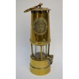 A brass miner's safety lamp, the Patent Utility Lamp Type A.1 by The Protector Lamp & Lighting Co.