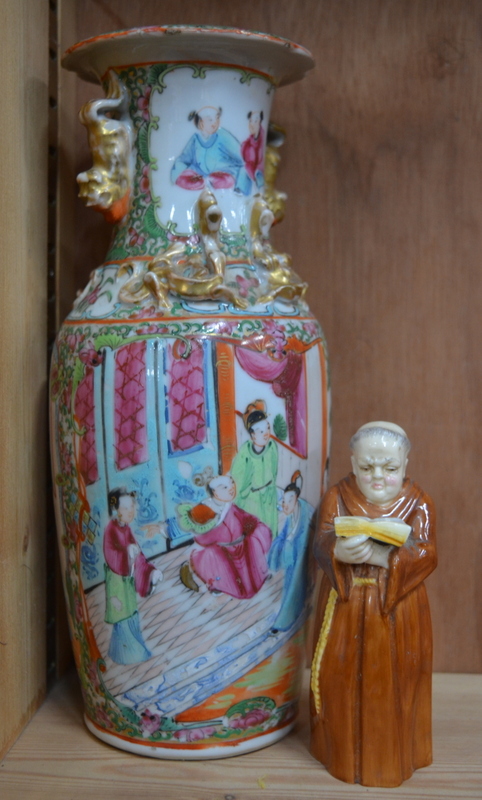 A Royal Worcester candle snuffer in the form of a monk,