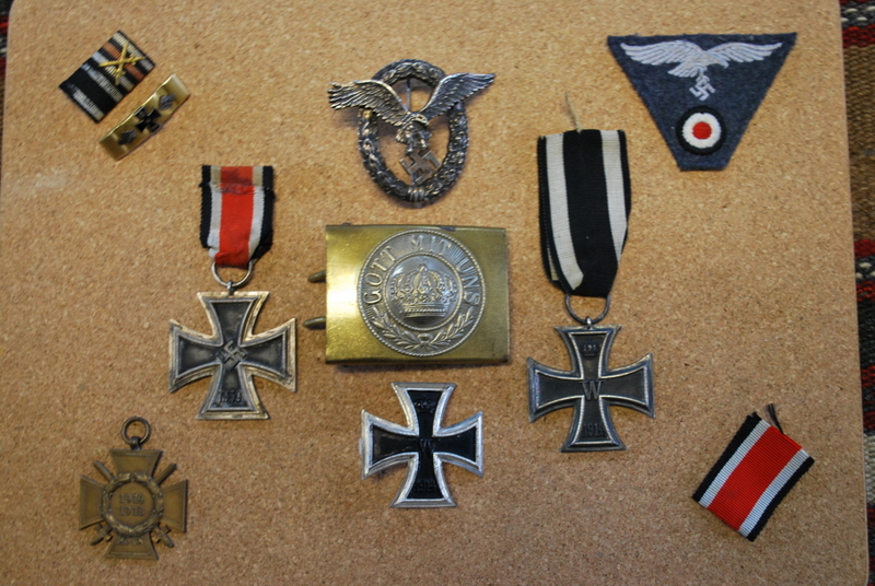 Three German iron crosses; a Gott Mit Uns belt buckle; 1918-18 Cross with swords;