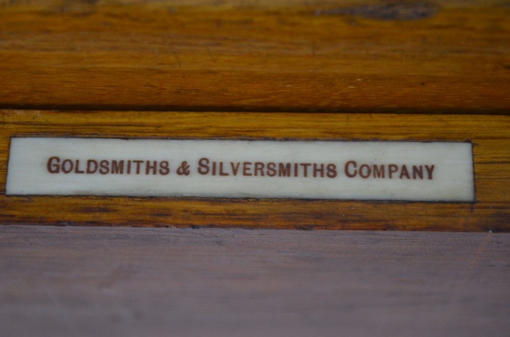 An Edwardian period oak canteen containing an extensive part set of OEP electroplated flatware for - Image 8 of 9