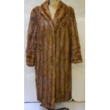 A full length shadowed mink fur coat retailed by Harvey Nichols, Knightsbridge,