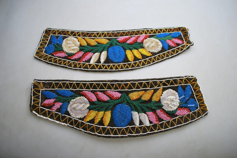 A pair of Native American textile and beadwork panels,