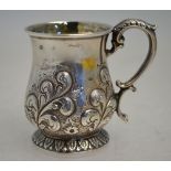 A small early Victorian silver baluster mug with scroll handle,