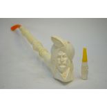 A modern Turkish Meerschaum large pipe, the bowl carved with a Sultan's head,