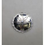 A large Navajo silver button with stamped design; the reverse with KB hallmark, 5.