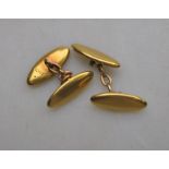 A pair of torpedo shaped chain linked cufflinks, yellow metal stamped 18ct,