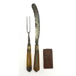 A pair of tortoiseshell fleams (blood-letting lancets) with folding steel blades,