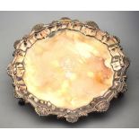 An early George III silver card salver with cast shell and scroll pie-crust border,