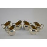 A set of six 800 grade miniature 'Amuse Bouche' jugs of classical form, 4.