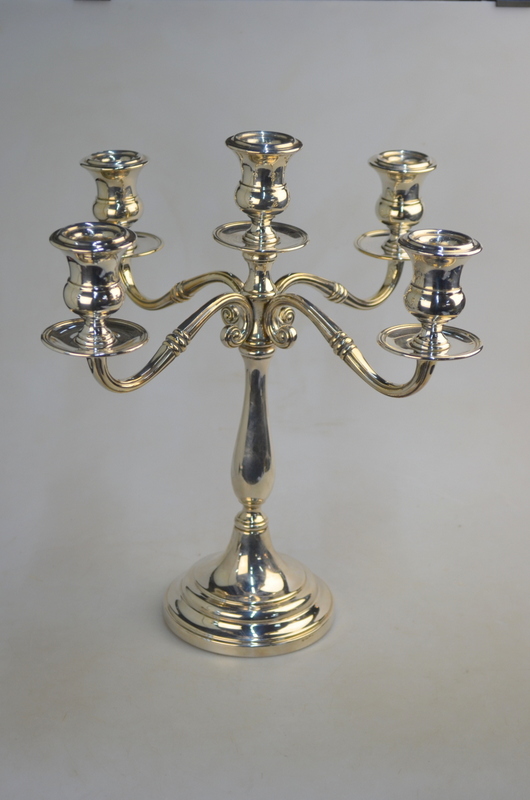 A Continental loaded 800 grade four-branch candelabrum with five sconces,