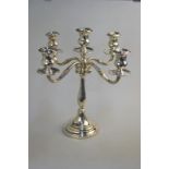 A Continental loaded 800 grade four-branch candelabrum with five sconces,