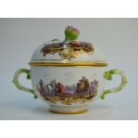 A 19th century Meissen chocolate cup decorated with two hand-painted vignettes - lady falconer,