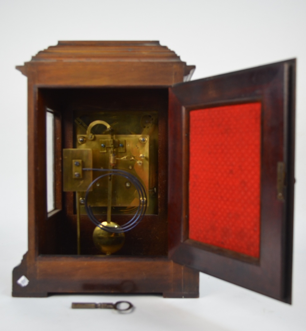 An early 20th century walnut cased eight-day mantel clock with silvered dial incorporating a - Image 3 of 5