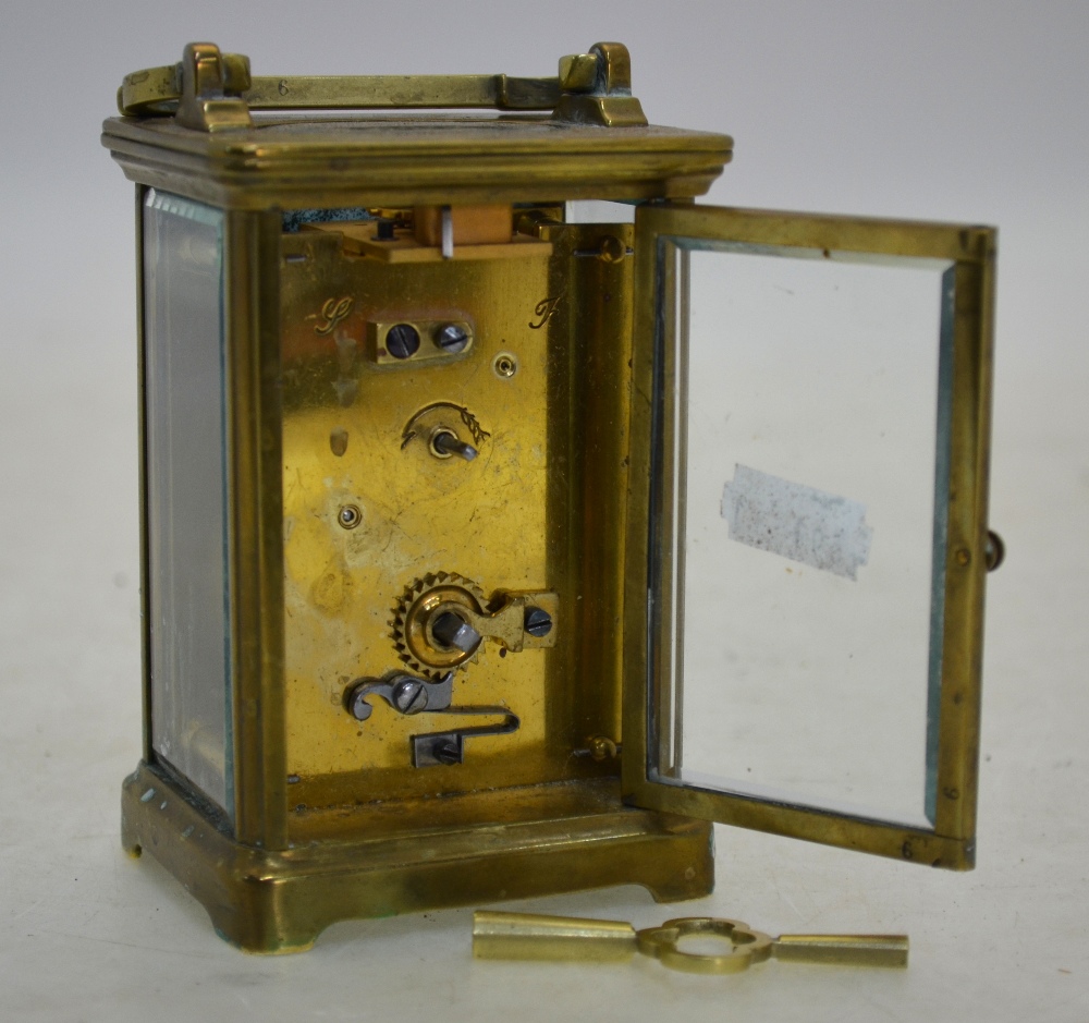 An English brass carriage clock with enamel dial, 15 cm high (including handle), - Image 2 of 5