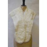 A vintage cream fur evening cape retailed by Packhards, Salisbury/Bournemouth,