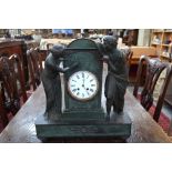 A 19th century French Empire style patinated bronze mantle clock with drum movement by Japy Freres,