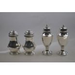 A pair of Asprey silver baluster pepperettes, Jubilee marked London 1934,
