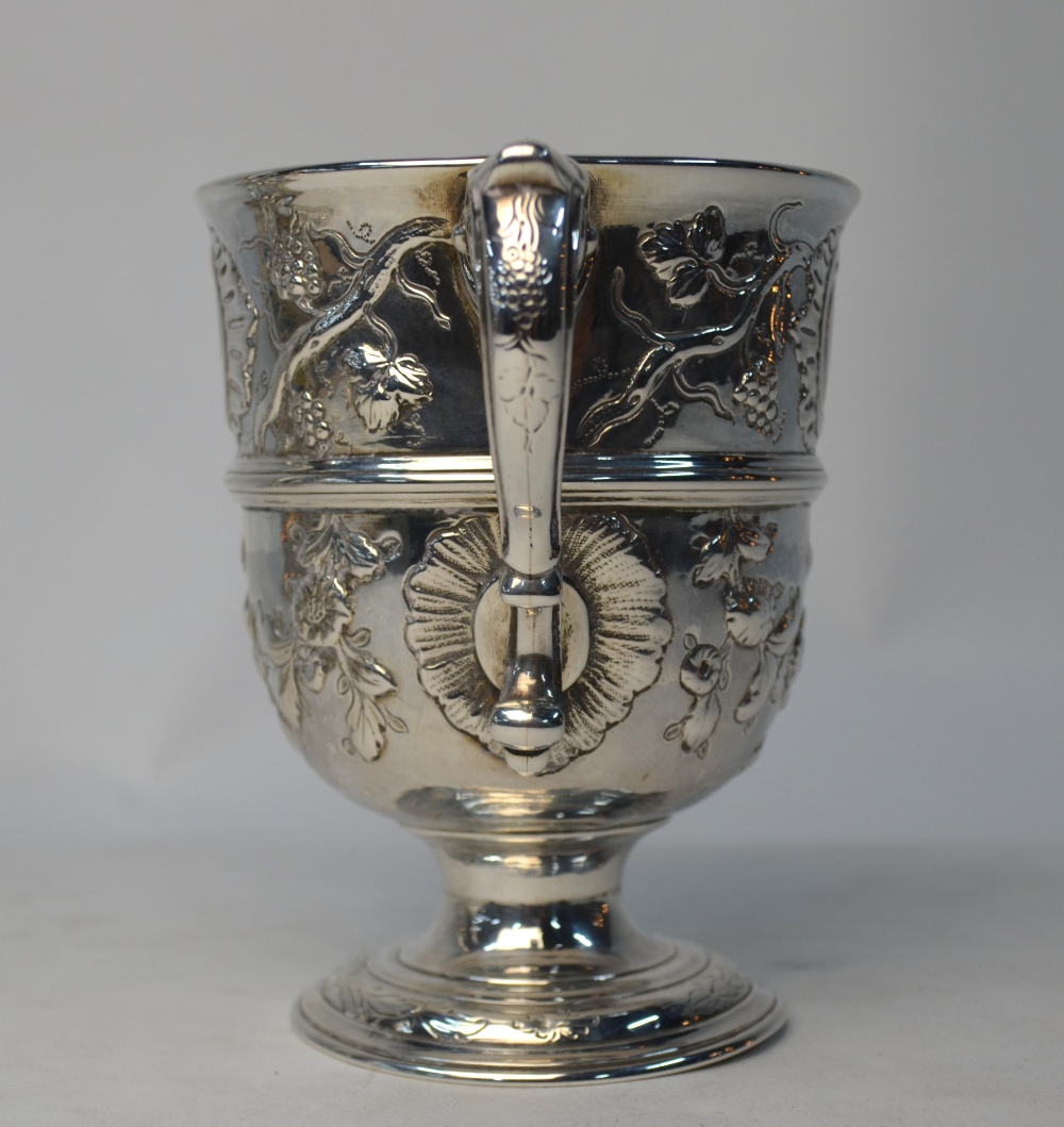 A 19th century two-handled loving cup in the Georgian manner, embossed with vines and rose garlands, - Image 3 of 5