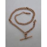 A 9ct rose gold graduated single Albert chain with swivel and bar, approx 37g,
