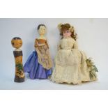 A Victorian wooden doll with painted head and poseable jointed limbs, 18 cm,