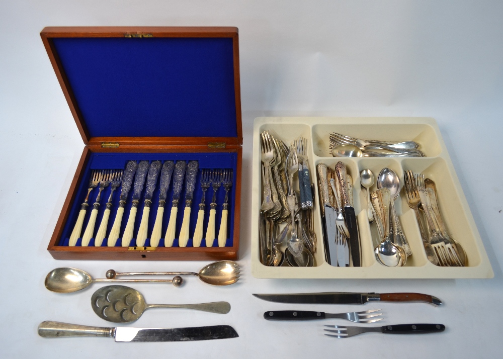 A set of six tablespoons and forks with floral embossed handles, stamped 800,