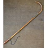 A turned wood bass crumhorn (archaic woodwind instrument),