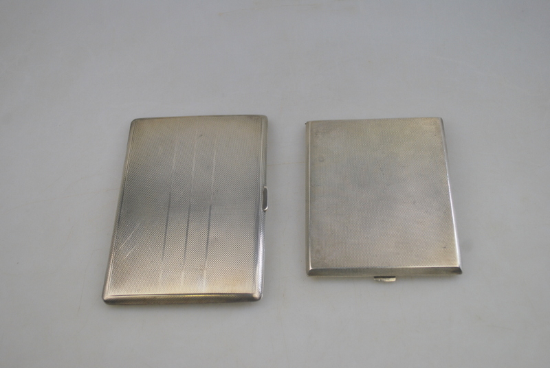 Two heavy quality engine-turned silver cigarette cases, Birmingham 1938/45, 11.