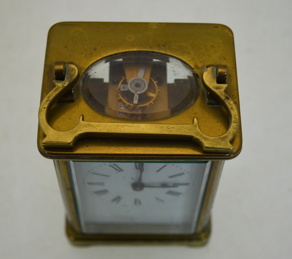 An English brass carriage clock with enamel dial, 15 cm high (including handle), - Image 3 of 5