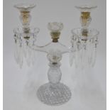 A 19th century lead crystal twin branch candelabrum, probably Irish,