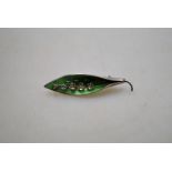 A silver green enamel and white paste Lily of the Valley brooch