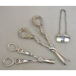 A pair of cast silver grape scissors with pierced handles, London 1988,