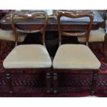 A harlequin set of eight Victorian mahogany dining side chairs having overstuffed seats and raised
