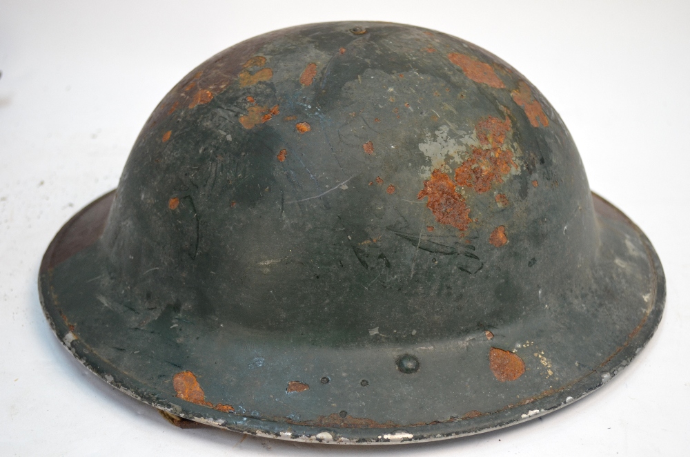 A British army steel helmet, dated 1940, - Image 5 of 9