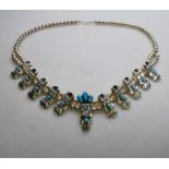 A fine Navajo silver and turquoise necklace by Doris Small Canyon,