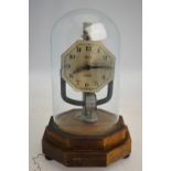 An Art Deco Bulle electric mantle clock by Pinchin Johnson, with octagonal silvered dial,