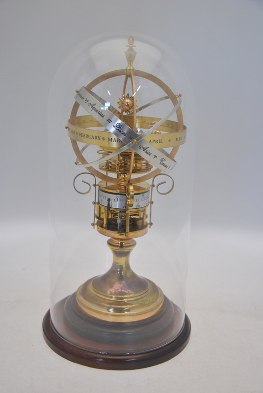 A brass and silvered Orrery astrological clock by Kellar, Peesemore,
