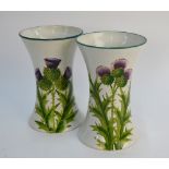 Wemyss - a pair of vases painted with thistles, impressed and painted marks, retailed by T.