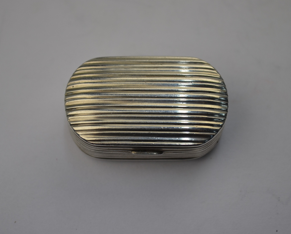 A George III silver vinaigrette with reeded case, the gilt interior with filigree grille,