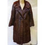 A vintage full-length brown fur coat retailed by Hickleys with brown satin lining,