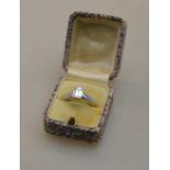 A single stone emerald cut diamond ring in 950 platinum four claw setting c/w GIA certificate