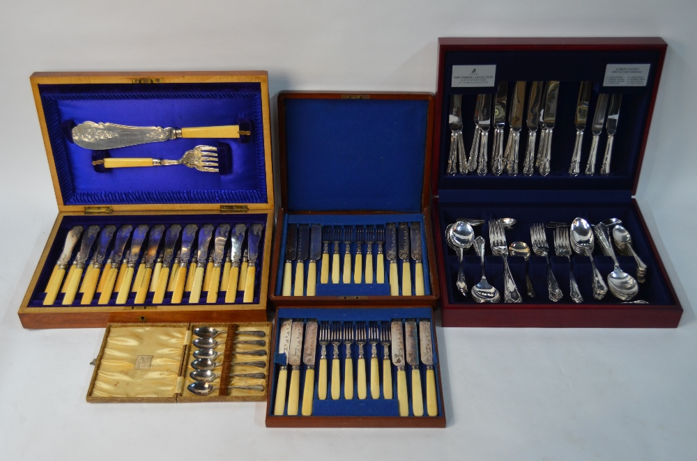 A Victorian mahogany-cased set of twelve each dessert knives and forks and an inlaid walnut canteen