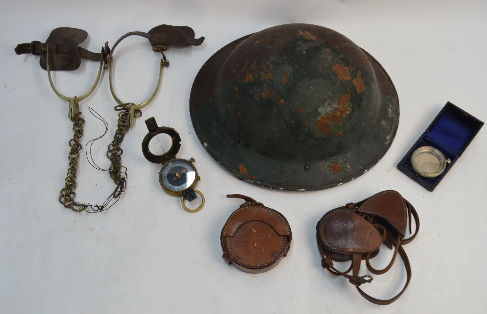 A British army steel helmet, dated 1940,