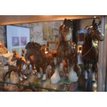 A collection of seven Beswick horses and two donkeys, comprising: Cantering Shire,
