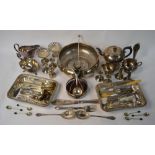 A quantity of electroplated wares including a large fruit bowl, planished three-piece tea service,