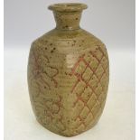 ** Phil Rogers (British born 1951) - Stoneware square bottle vase having wax resist floral and