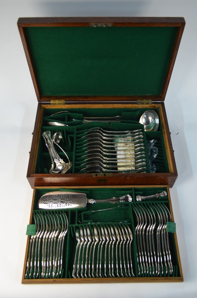 An electroplated part set of flatware for twelve including; soup ladle, basting spoons, fish slice,