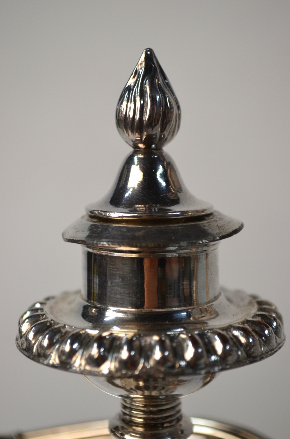 A pair of electroplated twin-branch candelabra on baluster pillars and circular bases - Image 4 of 8