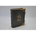 A Victorian brass-bound tooled Morocco leather Family Bible with colour plates