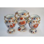 A 19th century Ironstone garniture set of vases, decorated in the Imari palette,